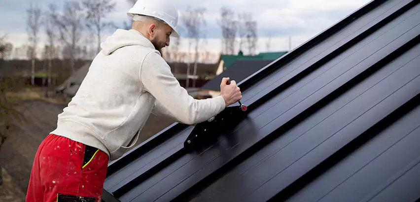 Tin Roof Ridge Cap Installation in Mundelein